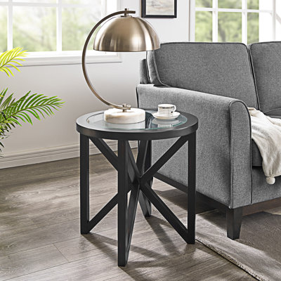 Petite table basse ronde avec plateau en verre