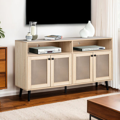 Meuble télé de style moderne du milieu du siècle, finitions rondes noires et bois naturel, structure en métal, idéal pour le salon.