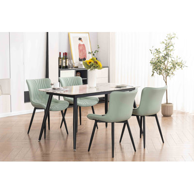 Lynnsey Tufted Leather Upholstered Dining Modern Wingback Side Chairs with Metal Legs -  Corrigan StudioÂ®, BDB37545BFAD45A89935112D6956B4D9