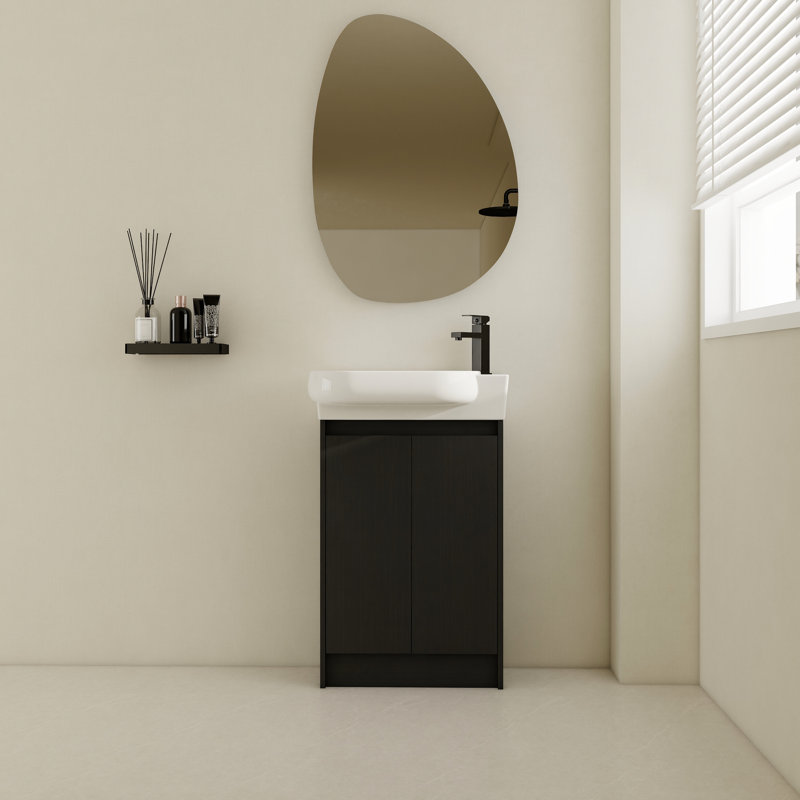 Meuble-lavabo de 23 po avec lavabo. Style compact et moderne. Performance de la porte à fermeture en douceur. Vaste espace de rangement. Aspect châtaignier noir. Lavabo sur meuble, autoportant