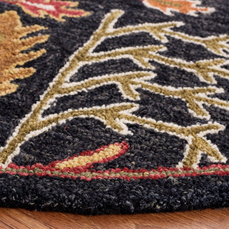 Donnett Southwestern Handmade Tufted Wool Black/Red Area Rug, Round 7'