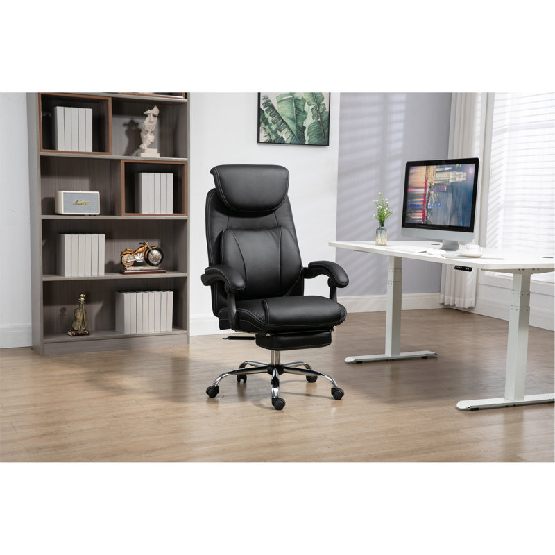 Comfortable Ergonomic Office Chair With Adjustable Features And Footrest For Enhanced Productivity And Relaxation.