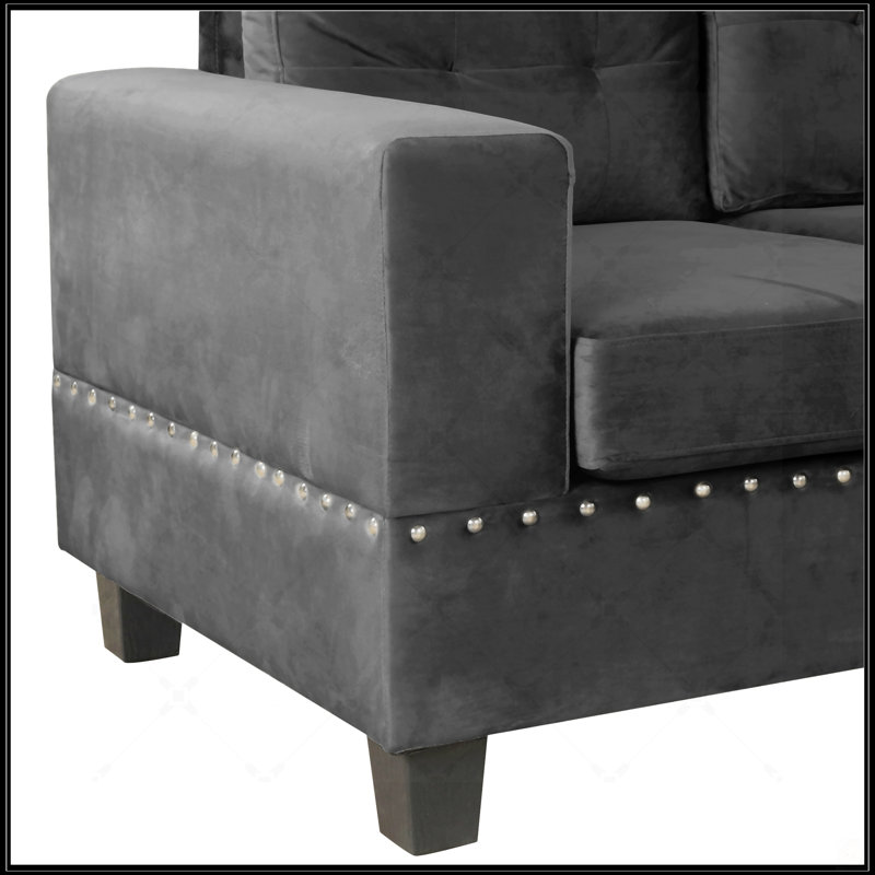 Canapé modulaire moderne en L avec repose-pieds de rangement, méridienne réversible et coussins pour le confort du salon