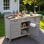 Îlot de cuisine extérieur avec plateau en acier inoxydable, grand tiroir, tablettes réglables, supports de rangement internes et 4 roulettes-125511764