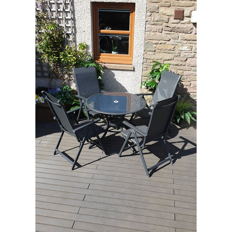 Kalloo 4 - Person Patio Dining Set Umbrella Hole Included Round Table