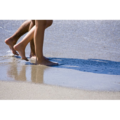 Marcher sur la plage par Claudio.Arnese