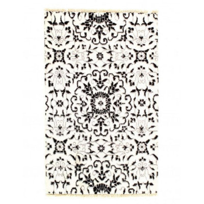 Niviah Floral Area Rug in White