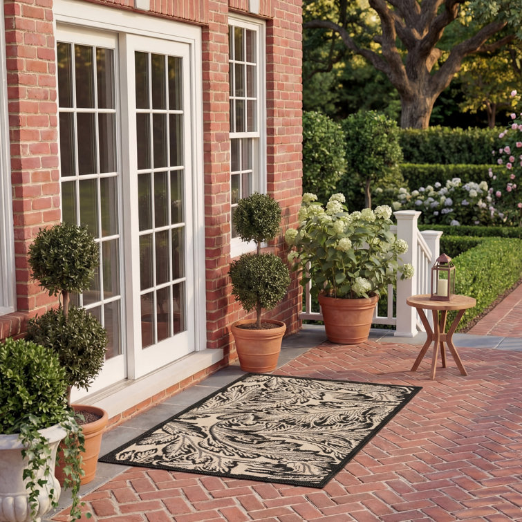 Tapis d'intérieur / extérieur floral Clapperton Performance