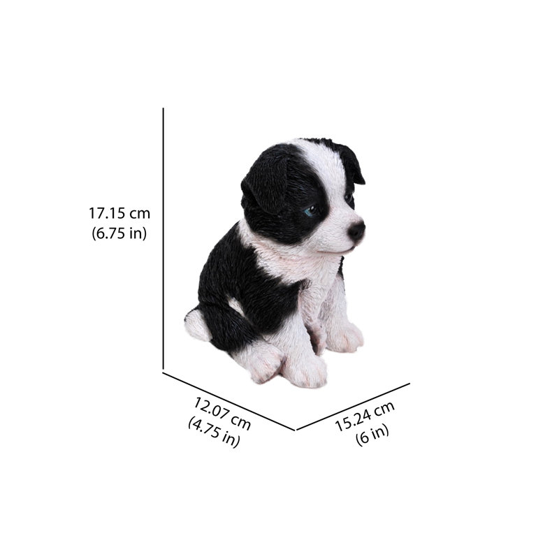 Statue d'un border collie assis