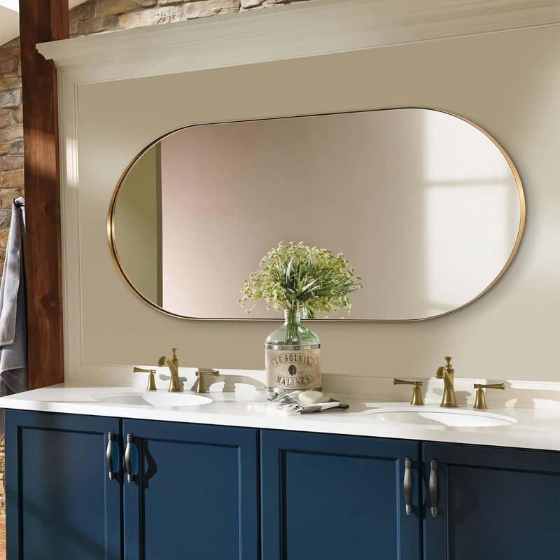 Miroir de salle de bain Kaitlee Cadre en acier inoxydable, Or brossé, 60 po x 30 po, Pilule