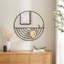 Miroir rond avec crochets à bijoux