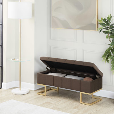 Banc de rangement contemporain en velours brun, structure en acier doré, revêtement capitonné, pattes en métal, couvercle rabattable, siège confortable, usage intérieur seulement, capacité de 227 kg, velours élégant, deux places