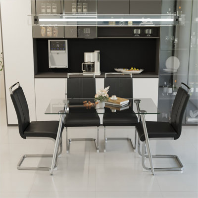 Ensemble de salle à manger moderne pour 4 personnes avec plateau en verre trempé et pieds plaqués argent, table rectangulaire transparente avec 4 chaises en similicuir