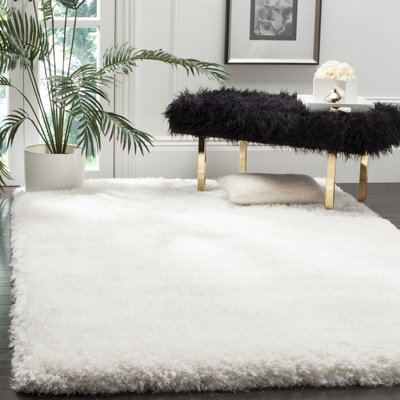 Handmade Tufted Ivory Area Rug