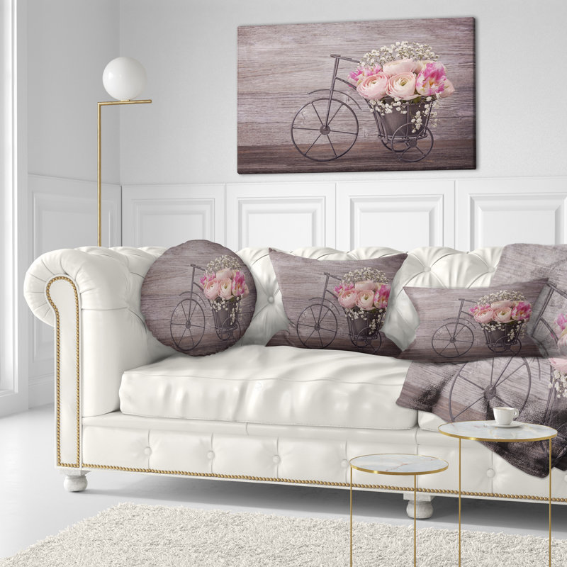 Coussin lombaire à fleurs florales sur bicyclette renoncule