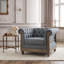 Fauteuil club capitonné avec garniture cloutée