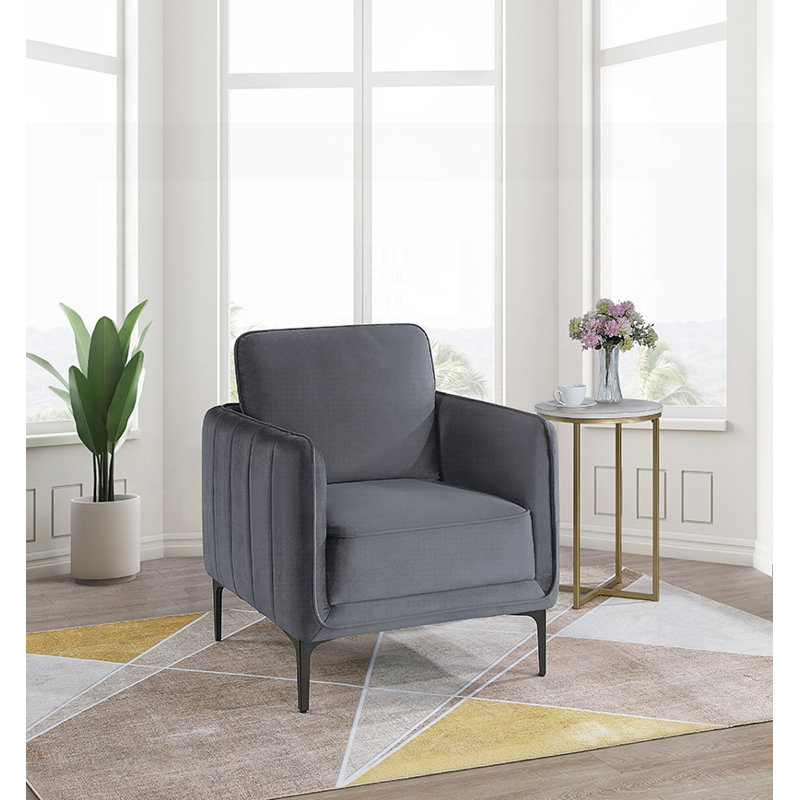 Élégant tissu d'ameublement en velours avec un capitonnage vertical, parfait pour les intérieurs modernes et classiques.