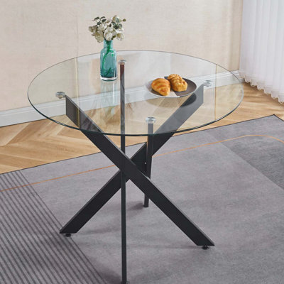 Table de salle à manger noire avec pieds croisés et verre trempé - moderne