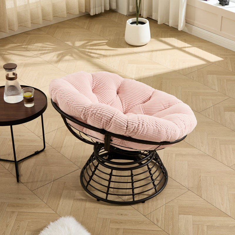 Chaise pivotante 360 avec un design ergonomique, coussin rose épais, structure en acier brun, pour les espaces intérieurs et extérieurs