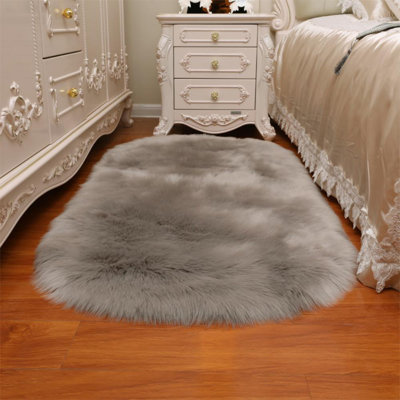 Oval 120 cm x 60 cm Faux Sheepskin Area Rug