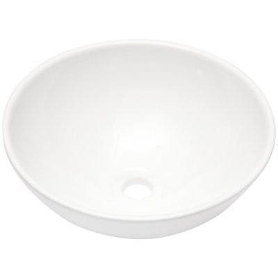 Lavabo vasque rond en céramique blanche pour salle de bain, 16 po x 16 po. Design contemporain. Céramique, faible absorption d'eau. Teinture facile d'entretien. 7,5 po de hauteur. Support de comptoir. Drain central de 1 3/4 po 16 po x 16 po
