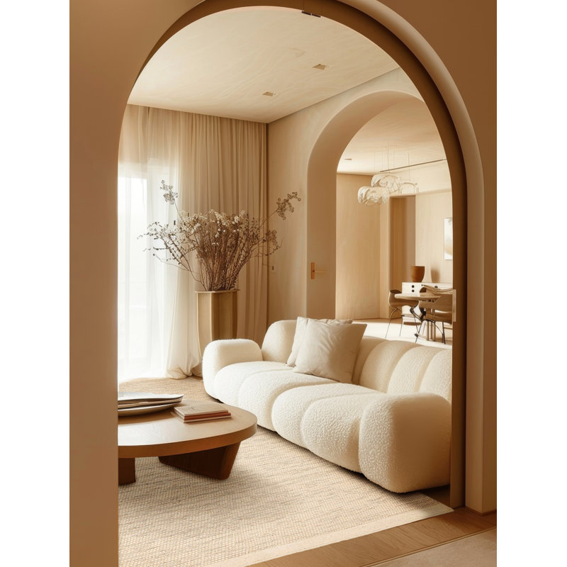 Confort moelleux avec un look et une texture artisanaux. Les fils doux et lustrés sont tissés à la main pour créer un éventail de textures, y compris des boucles surdimensionnées et des surfaces planes riches en dimensions.
