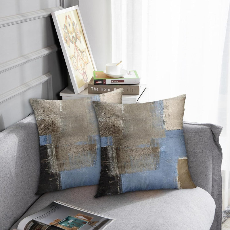 Housses de coussin bleues et beige
