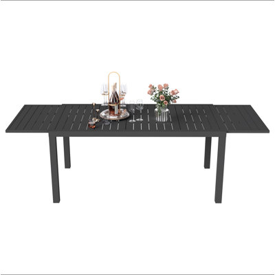 Table de salle à manger extensible en aluminium 97,2 po L