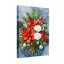 Arrangement floral de Noël avec poinsettias et pommes de pin
