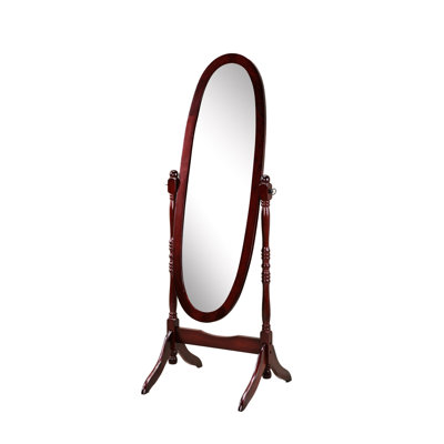 Miroir sur pied traditionnel au fini cerisier. Miroir ovale avec support. Autoportant et stable. 154 cm (H) x 57 cm (L) x 41 cm (P). Bois et verre.