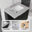 Meuble-lavabo suspendu avec lavabo, porte à fermeture douce et comptoir en marbre reconstitué-800937253