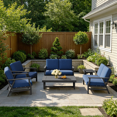 Ensemble de patio extérieur pour six personnes avec coussins et deux tables Shweta
