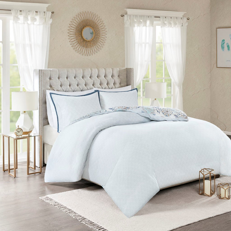 Housse de couette 3 pièces en coton à motifs floraux et géométriques, réversible.