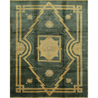 Tapis vert en laine noué à la main