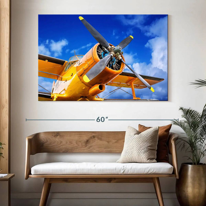 Avion à hélice jaune Mehar, H 34 po x l 51 po