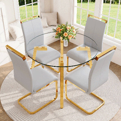 Ensemble de table de salle à manger moderne pour 4 personnes avec plateau en verre trempé et pieds en métal doré