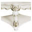 Table basse Vendome avec pieds à volutes et garniture décorative, parfaite pour les espaces de vie élégants