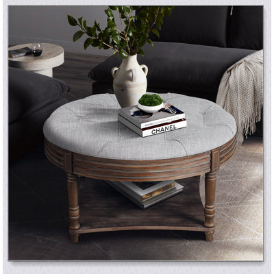 Grande table basse ronde avec repose-pieds imperméable avec rangement à 2 niveaux et capitonnage surdimensionné pour une vie élégante