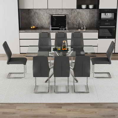 Modern Luxury Glass Dining Table Set With 8 Chairs, Silver Metal Legs, Dark Gray Pu Cushions - Stylish, Elegant, And Comfortable For Dining