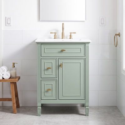 Meuble-lavabo moderne autoportant de 61 cm (24 po) avec lavabo simple en céramique intégrée, 1 tiroir supérieur inclinable, 2 tiroirs standards, structure en bois massif et MDF avec étagères réglables.