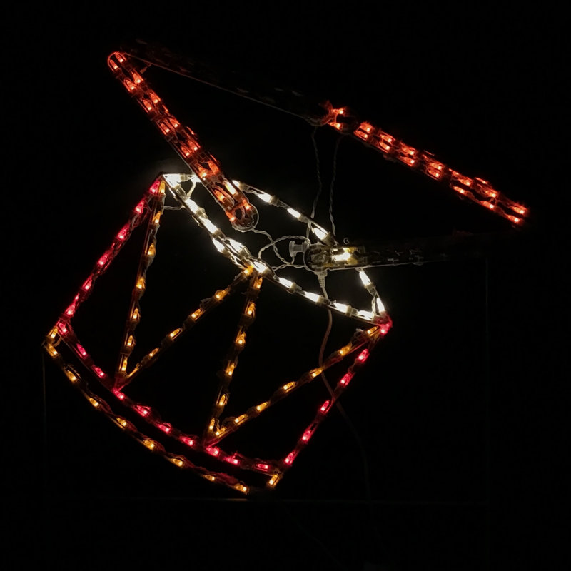 Tambour animé avec bâtons lumineux