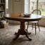 Saddle Brown Espresso Solid Rubberwood Oval Pedestal Dining Set with Self Storing Leaf and Faux Leather Slat Back Chairs