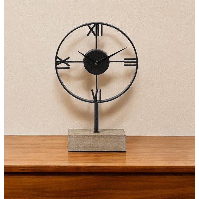 Horloge de table en métal noir avec cadre ouvert en métal