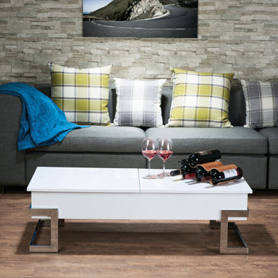 Table basse blanche à plateau relevable ultrabrillant avec capacité de rangement pratique