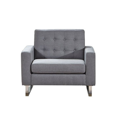Fauteuil capitonné