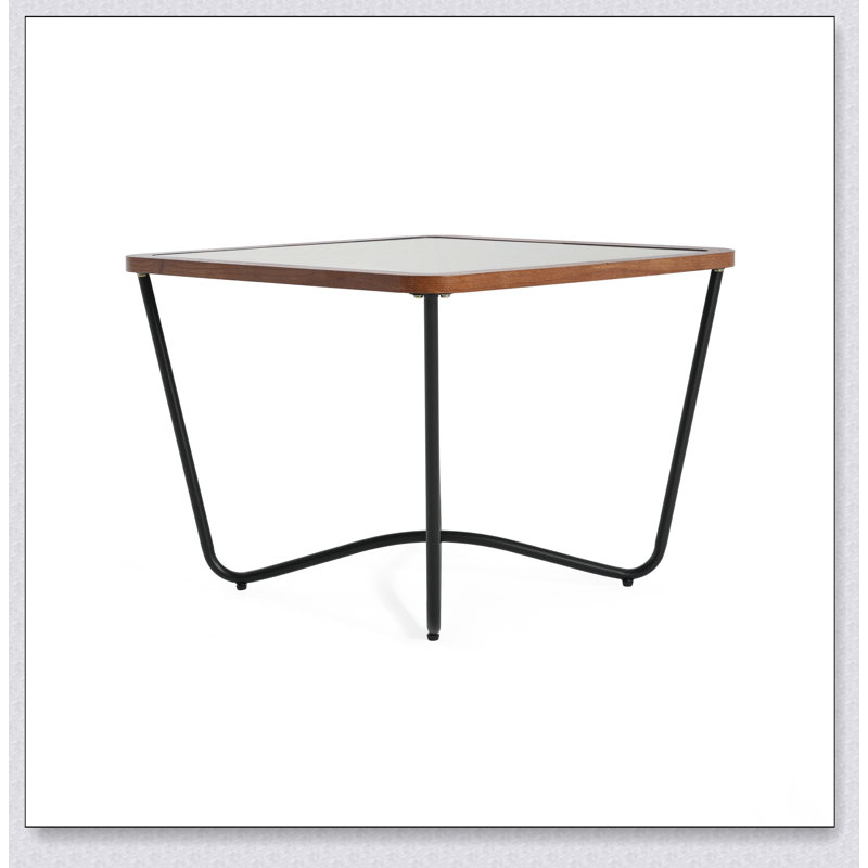 Table basse moderne carrée avec plateau en verre trempé et structure en métal robuste, parfaite pour les intérieurs contemporains et industriels.