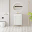 Meuble-lavabo à tablettes ouvertes de 21,6 po avec lavabo en céramique et porte à fermeture en douceur, parfait pour le rangement de vestiaire et le design moderne-116332417