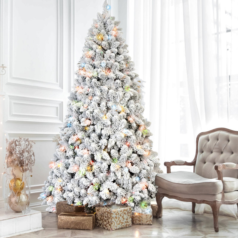 Arbre de Noël floqué avec lumières Ul colorées et pommes de pin naturelles - pointes en PVC enneigées, branches articulées, support en métal stable, installation facile