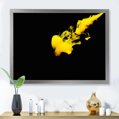 " A Cloud Of Yellow Paint Released Into Clear Water "