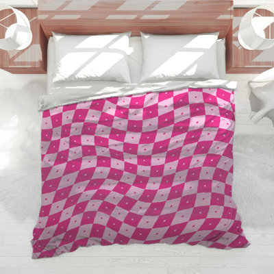 Édredon rose à carreaux ondulés
